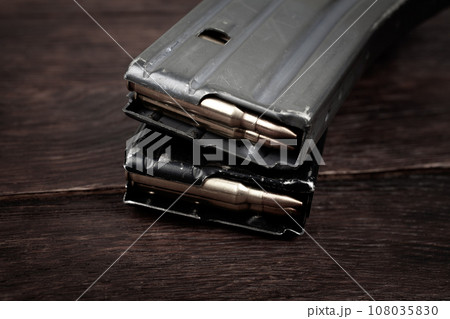 Ammunition with magazine on wooden Ammunition with magazine on wooden 108035830