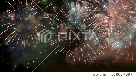 Colorful vibrant Firework celebrate anniversary happy new year 2023, 4th of july holiday festival. colorful firework in the night time to celebrate national holiday. countdown new year 2023 party time 108037997