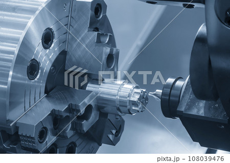 The CNC lathe machine chamfer milling cut the metal shaft parts. 108039476