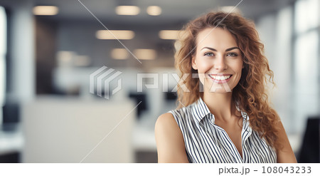 Smiling businesswoman in office 108043233