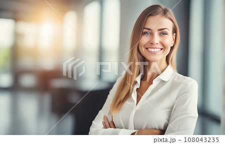 Smiling businesswoman in office 108043235