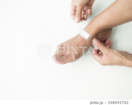 Bandage Plaster on Leg Woman, Injury Accident Healthcare Medicine Pharmacy in Laboratory, Apply and Adhesive Wound , Aid Band Hurt Bandaid Care. Bandage Plaster on Leg Woman, Injury Accident Healthcare Medicine Pharmacy in Laboratory, Apply and Adhesive Wound , Aid Band Hurt Bandaid Care. 108045782