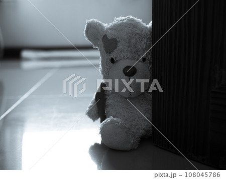 Broken Heart Concept with Alone Teddy Bear Sitting in Room Vintage Card sign Marriage Pain Sad Couple Valentine Day Love Disappointed Symbols Divorce Break Decorative Poster Holiday Space. 108045786