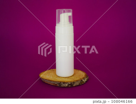Empty white packaging tube for beauty spa, medical skin care and cosmetic lotion cream packaging, face wash foam, product design layout on purple background Empty white packaging tube for beauty spa, medical skin care and cosmetic lotion cream packaging, face wash foam, product design layout on purple background 108046166