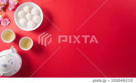 Tang Yuan(sweet dumplings balls), a traditional chinese cuisine for Mid-autumn, Dongzhi (winter solstice festival ) and Chinese new year. Tang Yuan(sweet dumplings balls), a traditional chinese cuisine for Mid-autumn, Dongzhi (winter solstice festival ) and Chinese new year. 108046219