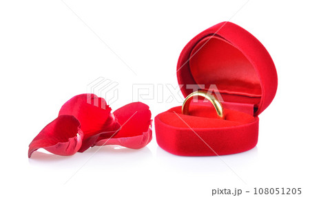 red box gold ring and rose petals on white red box gold ring and rose petals on white 108051205