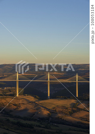 Multi-span cable stayed Millau Viaduct across gorge valley of Tarn River, Aveyron Departement, France 108053184