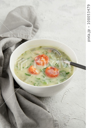 Typical Portuguese soup Caldo Verde on gray background close up 108053479