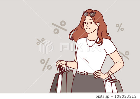 Woman shopaholic returns from store with packages and stands among percent symbols Woman shopaholic returns from store with packages and stands among percent symbols 108053515