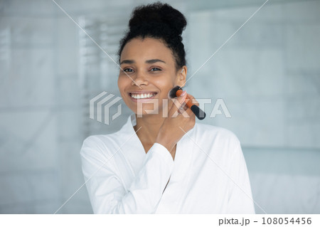 Portrait of african American woman do make up 108054456