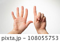 Men's hands gesture counting on fingers six palmar side 108055753