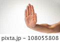 woman's hand with forearm gesture stop on a white background 108055808