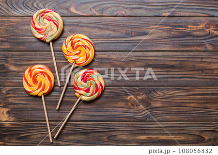Set of colorful lollipops on colored background. Summer concept. Party Happy Birthday or Minimalist Concept 108056332