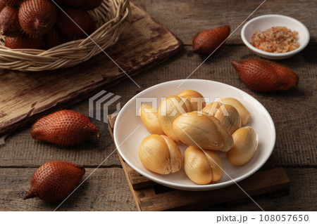 Peeled Salak (Salacca zalacca) fruit in white plate Peeled Salak (Salacca zalacca) fruit in white plate 108057650