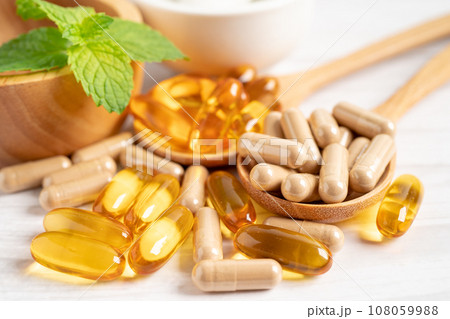 Alternative medicine herbal organic capsule with vitamin E omega 3 fish oil, mineral, drug with herbs leaf natural supplements for healthy good life. 108059988
