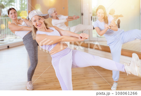 Dynamic middle-aged woman dancing hip-hop Dynamic middle-aged woman dancing hip-hop 108061266