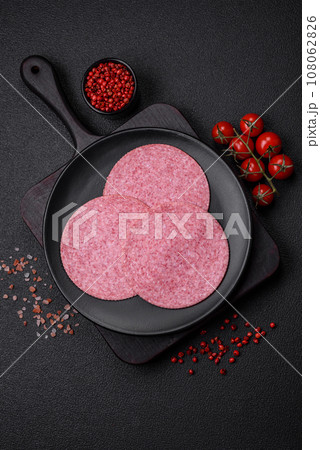 Delicious smoked salami sausage with salt, spices and herbs Delicious smoked salami sausage with salt, spices and herbs 108062826