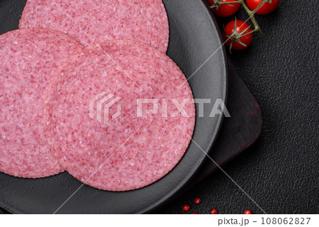 Delicious smoked salami sausage with salt, spices and herbs 108062827