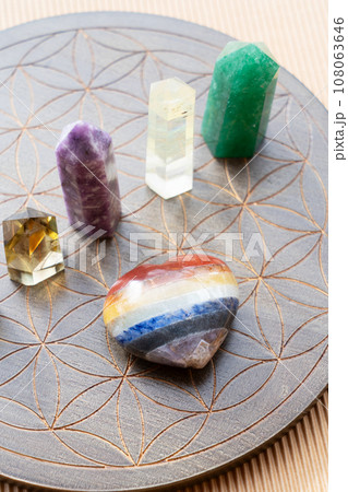 Healing crystals on brown background Healing crystals on brown background 108063646