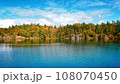 Pink Lake, Gatineau, Quebec, Canada during fall season with colorful tree 108070450