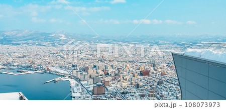 Beautiful landscape and cityscape from Hakodate Mountain with Snow in winter season. landmark and popular for attractions in Hokkaido, Japan.Travel and Vacation concept Beautiful landscape and cityscape from Hakodate Mountain with Snow in winter season. landmark and popular for attractions in Hokkaido, Japan.Travel and Vacation concept 108073973