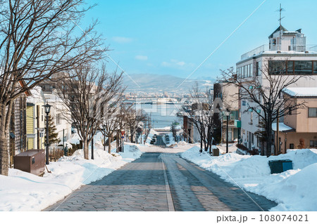 Hachiman Zaka Slope with Snow in winter season. landmark and popular for attractions in Hokkaido, Japan. Travel and Vacation concept 108074021