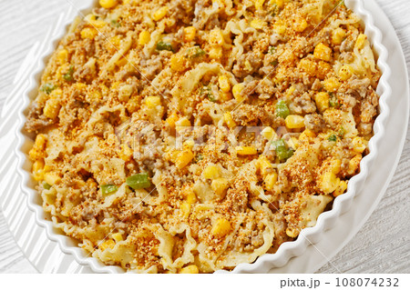 Creamy Corn Casserole with Sausage in baking dish 108074232