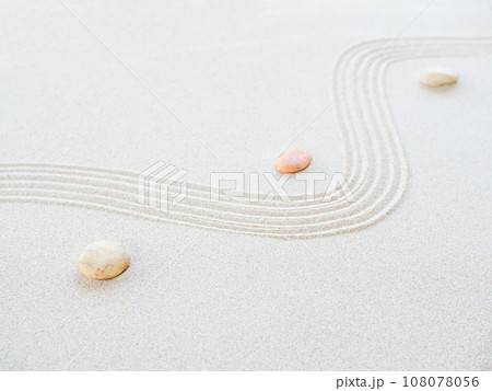 Zen Pattern Background Sand Garden japanese Stone Pebble Abstract Texture White Beach Spa Aroma Japan Nature Top View Space, Concept for Stability Still Balance Meditation Yoga Harmony Wellness. Zen Pattern Background Sand Garden japanese Stone Pebble Abstract Texture White Beach Spa Aroma Japan Nature Top View Space, Concept for Stability Still Balance Meditation Yoga Harmony Wellness. 108078056