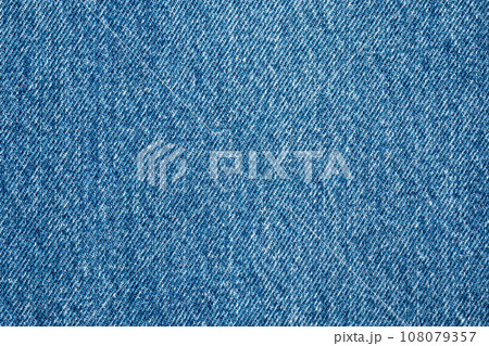 Denim blue jeans texture close up background top view Denim blue jeans texture close up background top view 108079357