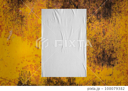 Blank white wheatpaste glued paper poster mockup on old metal wall background Blank white wheatpaste glued paper poster mockup on old metal wall background 108079382