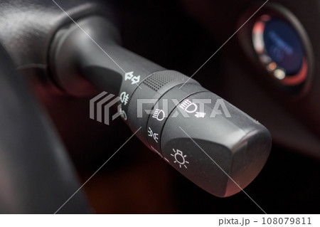 Car light control switch close up Car light control switch close up 108079811