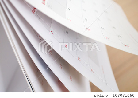 Calendar page flipping sheet close up blur background business schedule planning appointment meeting concept 108081060