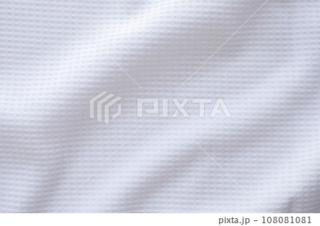 White sports clothing fabric football shirt jersey texture abstract background White sports clothing fabric football shirt jersey texture abstract background 108081081