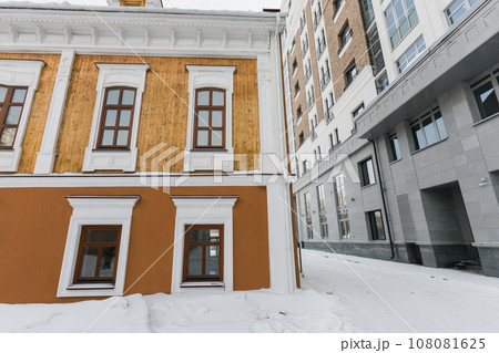 Building and houses in winter season. Snow in city and town architecture Building and houses in winter season. Snow in city and town architecture 108081625