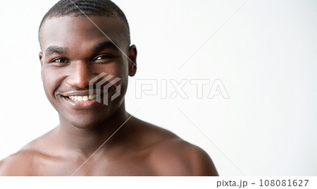 Man wellness. Skincare hygiene. Confident positive happy handsome shirtless guy face with toothy smile clean skin isolated on white background empty space. Man wellness. Skincare hygiene. Confident positive happy handsome shirtless guy face with toothy smile clean skin isolated on white background empty space. 108081627