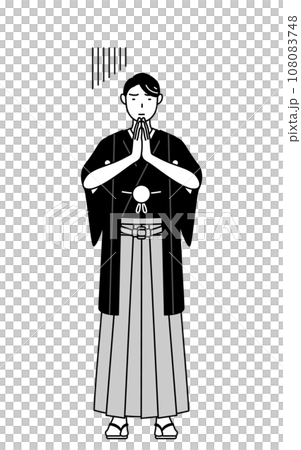 体の前で手を合わせて謝る紋付袴姿の男性 108083748