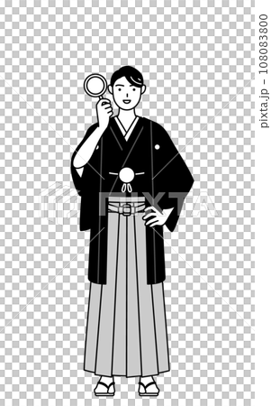 一個穿著鳳頭袴的男人透過放大鏡看 一個穿著鳳頭袴的男人透過放大鏡看 108083800