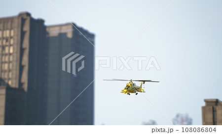 Yellow helicopter during a rescue operation in the city. 3d render 108086804