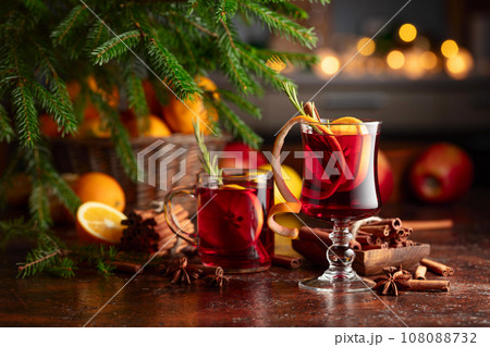Christmas mulled wine with citrus, apples, cinnamon, anise, and rosemary. Christmas mulled wine with citrus, apples, cinnamon, anise, and rosemary. 108088732