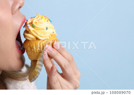Hand with Dessert Hand with Dessert 108089070