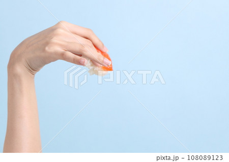 Hand with Sushi Hand with Sushi 108089123