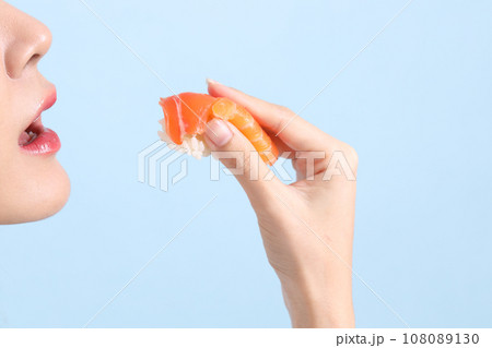 Hand with Sushi 108089130