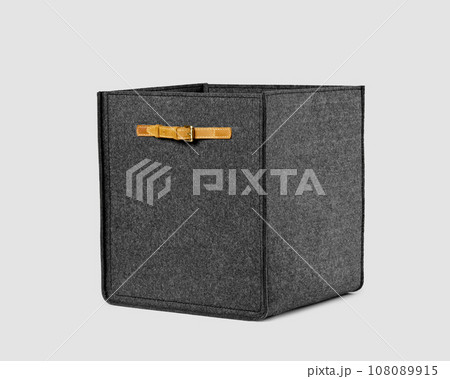 Handcrafted gray felt box with leather handles for organizing home space Handcrafted gray felt box with leather handles for organizing home space 108089915