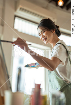 hand of artist with brush painting picture art, creativity, artistic and artwork, painting concept 108090170