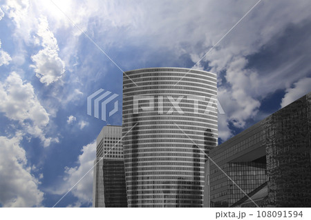 Skyscrapers La Defense (against the background of sky with clouds), commercial and business center of Paris, France 108091594