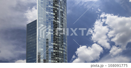 Skyscrapers La Defense (against the background of sky with clouds), commercial and business center of Paris, France Skyscrapers La Defense (against the background of sky with clouds), commercial and business center of Paris, France 108091775