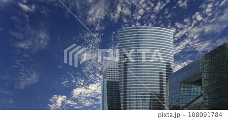 Skyscrapers La Defense (against the background of sky with clouds), commercial and business center of Paris, France Skyscrapers La Defense (against the background of sky with clouds), commercial and business center of Paris, France 108091784
