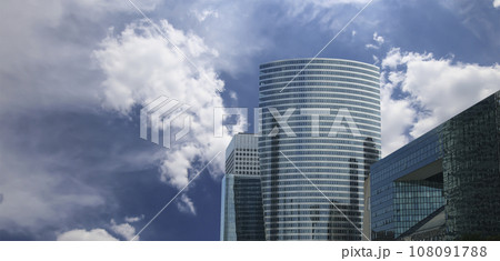 Skyscrapers La Defense (against the background of sky with clouds), commercial and business center of Paris, France Skyscrapers La Defense (against the background of sky with clouds), commercial and business center of Paris, France 108091788