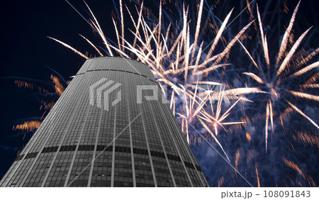Celebratory fireworks over the Skyscrapers La Defense, commercial and business center of Paris, France Celebratory fireworks over the Skyscrapers La Defense, commercial and business center of Paris, France 108091843