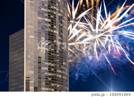 Celebratory fireworks over the Skyscrapers La Defense, commercial and business center of Paris, France Celebratory fireworks over the Skyscrapers La Defense, commercial and business center of Paris, France 108091869